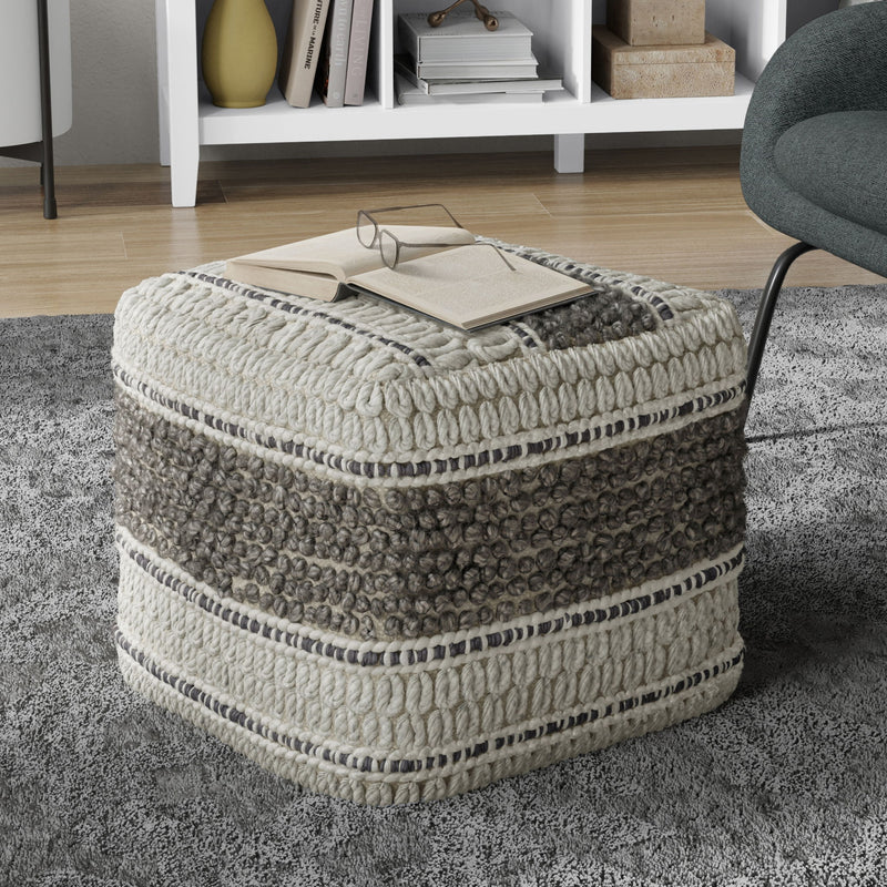 Handcrafted square accent pouf from Simpli-Home, featuring a soft fabric cover and sturdy construction, perfect for living room decor.