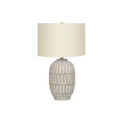 Cream transitional 8th Street table lamp with a sleek design, perfect for ambient lighting in living spaces.