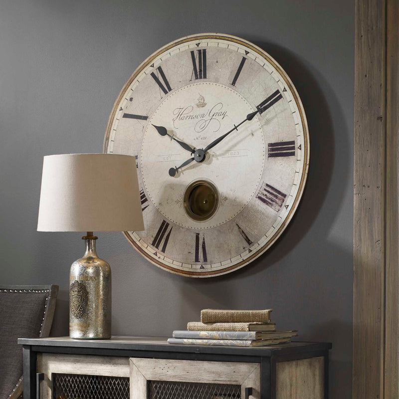 Uttermost Harrison Gray wall clock with a modern round design and sleek gray finish, suitable for contemporary home decor.