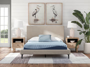 Sierra Sleep® Peak 2.0 8-inch memory foam mattress showing plush top surface and supportive foam layers in a bedroom setting.