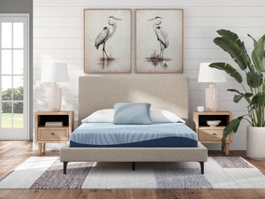 Sierra Sleep® Peak 2.0 8-inch memory foam mattress showing plush top surface and supportive foam layers in a bedroom setting.