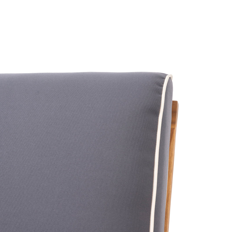 Outdoor Noble House patio lounge chair, stylish arm chair with cushioned seating for outdoor relaxation and leisure.