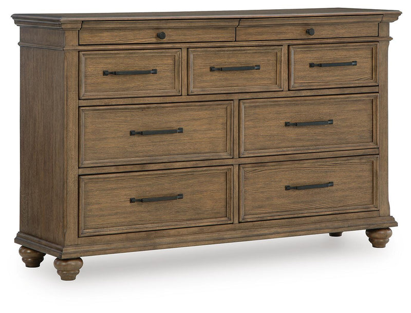 Signature Design by Ashley Karallin dresser with multiple drawers and modern wood finish, ideal for bedroom storage.