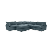 Classic Home Caplan 6-piece modular sectional with ottoman, showing plush fabric cushions and modern living room setup.