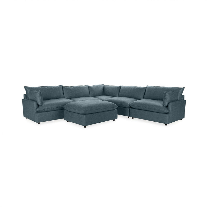 Classic Home Caplan 6-piece modular sectional with ottoman, showing plush fabric cushions and modern living room setup.