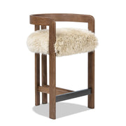 Jennifer Taylor Home Millwick low back counter stool with wooden legs and upholstered seat, suitable for counter height dining.