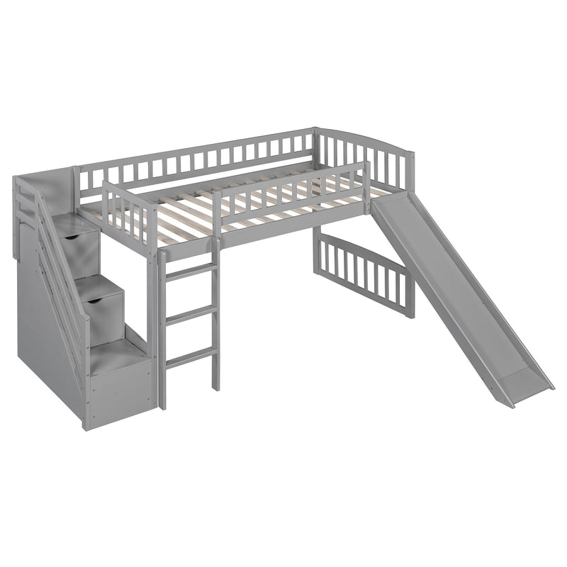 DreamHaus loft stairway bed with two drawers, convertible ladder, and slide, shown with a cozy mattress and colorful bedding.