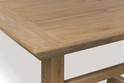 Benchcraft® Ridgester rectangular dining room counter table in light brown wood with sturdy legs and smooth tabletop surface.