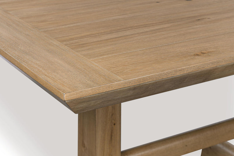 Benchcraft® Ridgester rectangular dining room counter table in light brown wood with sturdy legs and smooth tabletop surface.