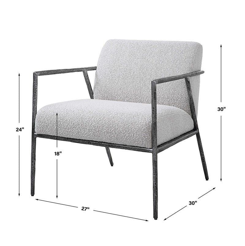 Light gray Uttermost Brisbane accent chair with sleek modern design and wooden legs, perfect for living room or bedroom decor.