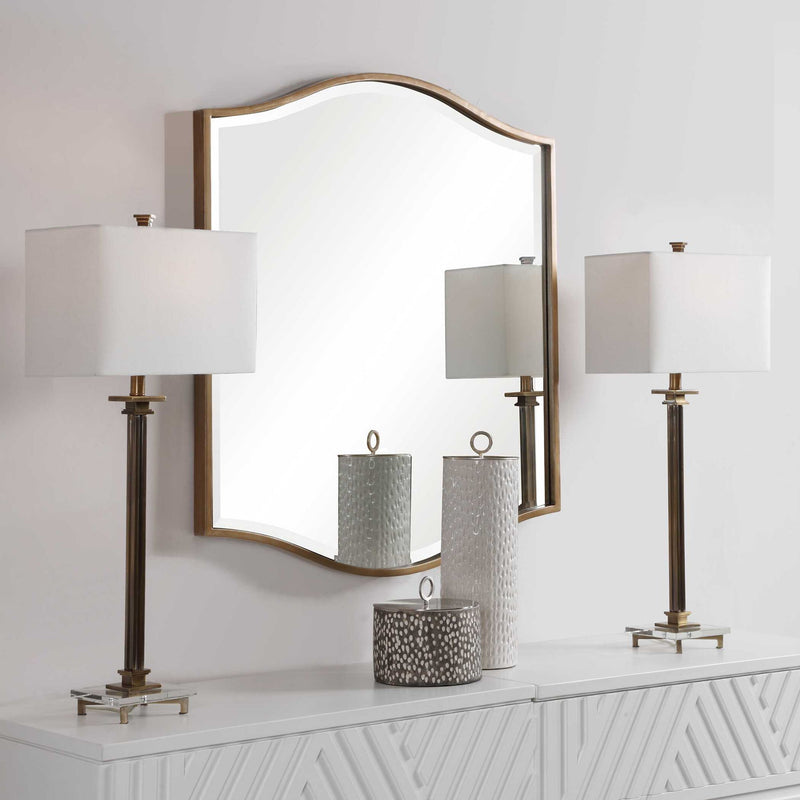 Gold Cerise wall mirror by Uttermost featuring a round mirror with a stylish gold frame for modern decor accents.