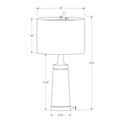 Contemporary black and cream resin table lamp by 8th Street, with a sleek modern design and cylindrical shape.
