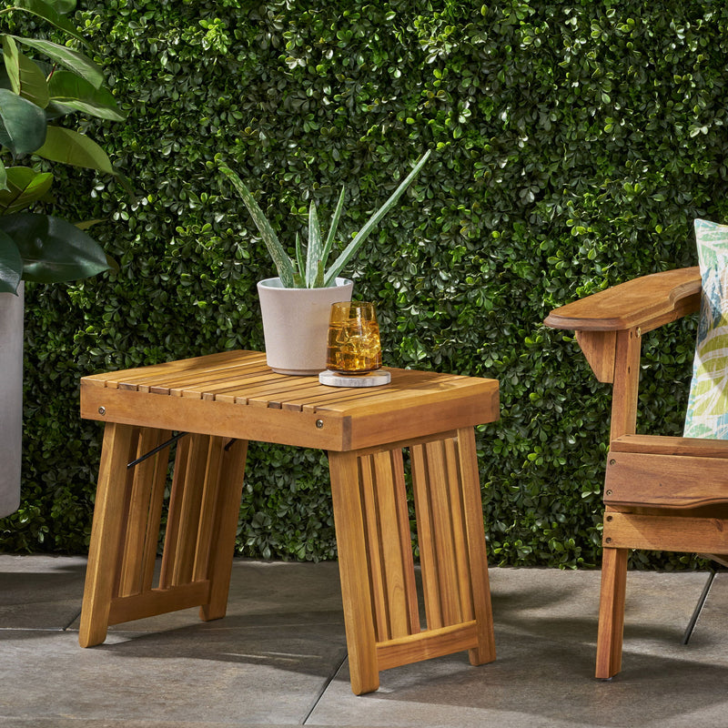 Noble House Temptation outdoor foldable side table with slat design, lightweight and portable for patio or garden use.