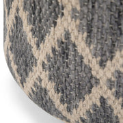 Simpli-Home Edgeley round handcrafted accent pouf with soft fabric and cozy design, perfect for living room or seating area.