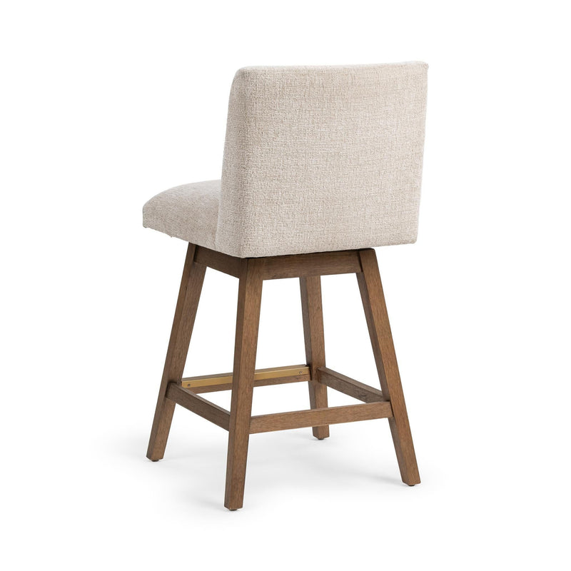 Classic Home Ava swivel counter stool in vanilla oat fabric with a dark wooden base, designed for 24-27 inch counter height.