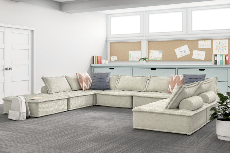 Signature Design by Ashley stationary Bales sectional sofa with plush cushions and modern fabric upholstery in a cozy living room setting.
