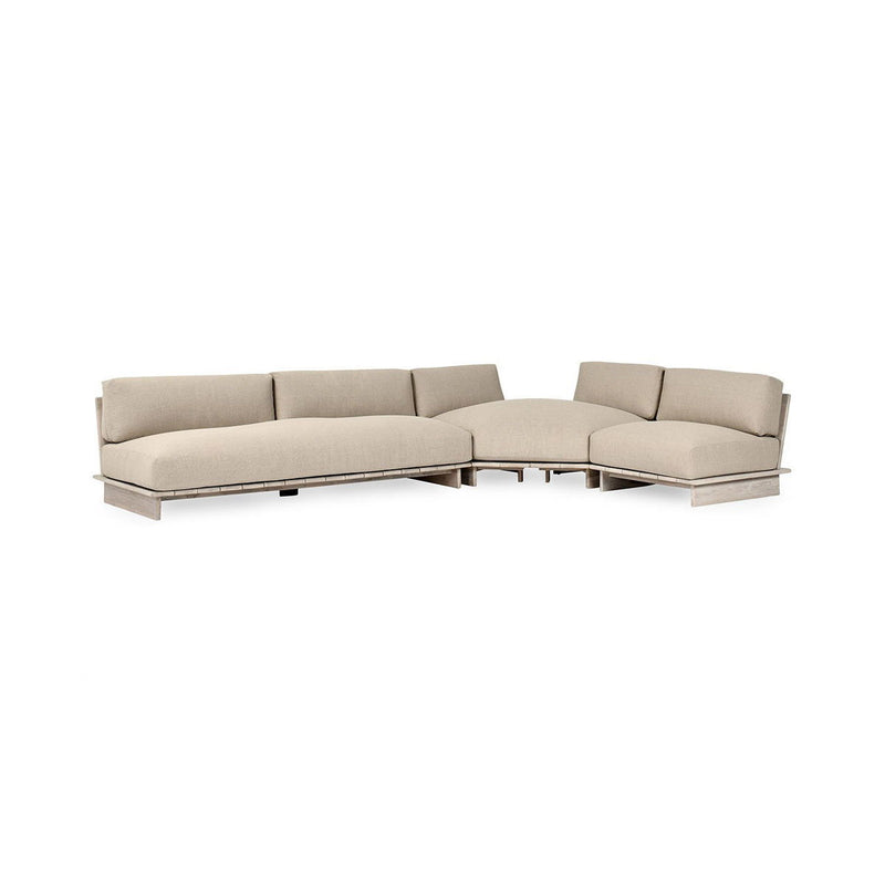 Livia teak outdoor sectional by Classic Home with taupe cushions, featuring three stationary seating pieces on a patio.