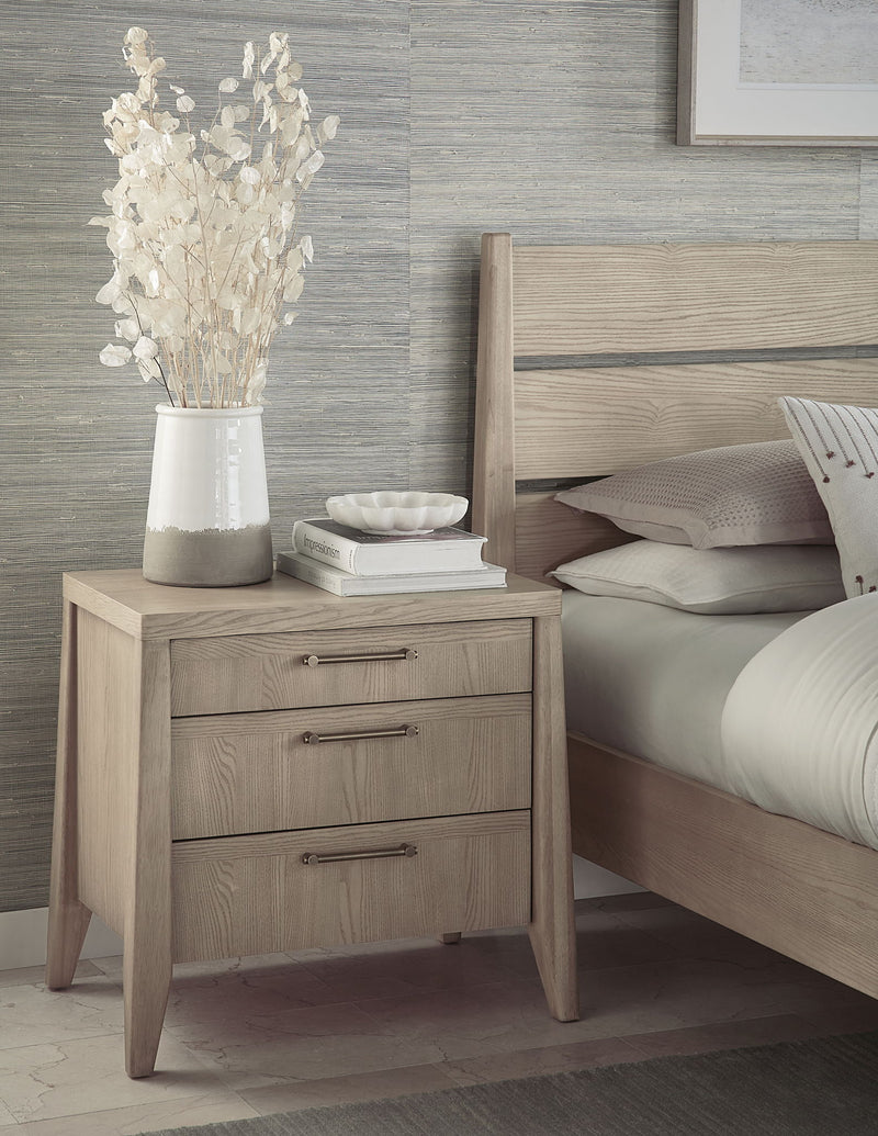 Modus Sumire three-drawer ash wood nightstand in ginger finish showing smooth surface and modern design.