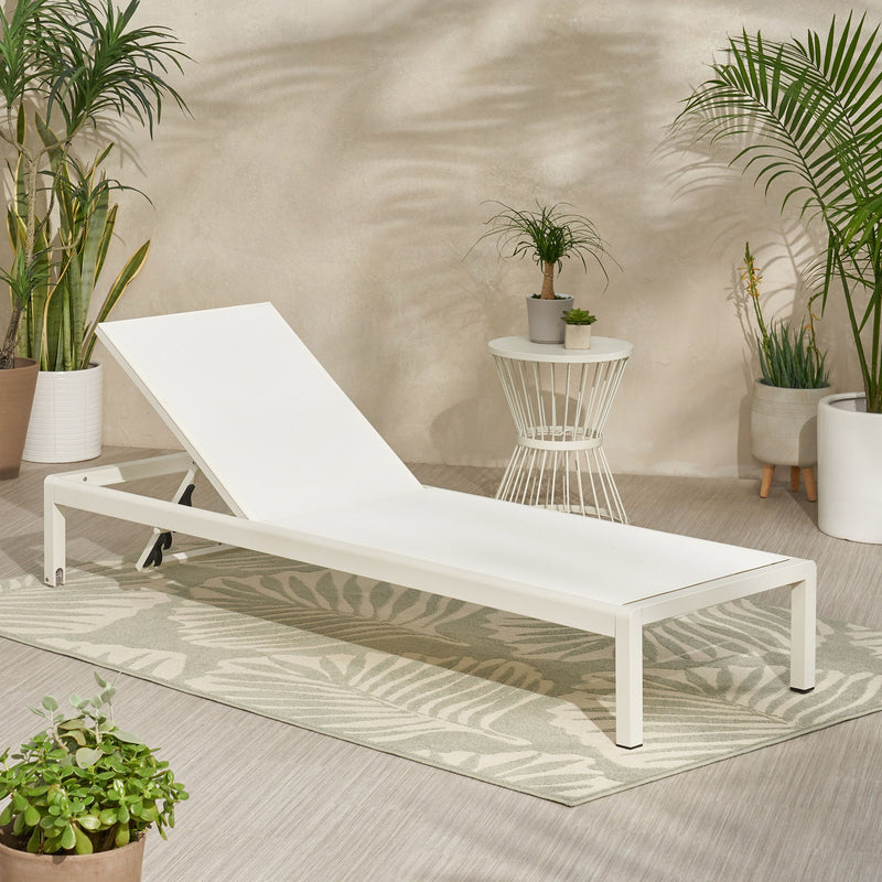 Noble House outdoor patio chaise lounge with five reclining positions, featuring a sturdy frame and comfortable cushioned seat.