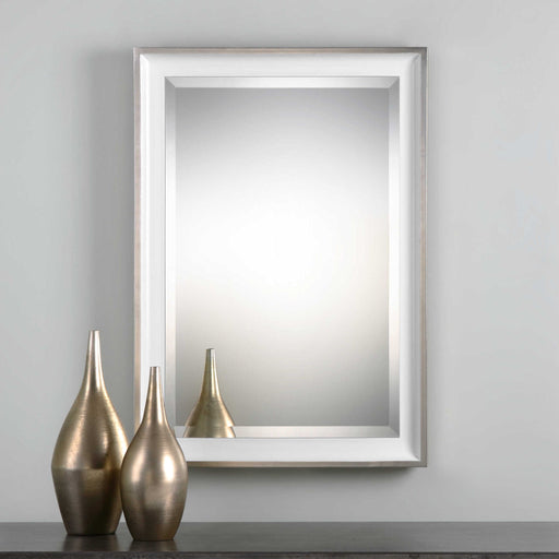Uttermost Lahvahn wall mirror with white and silver finish, featuring a sleek, modern design and reflective glass surface.