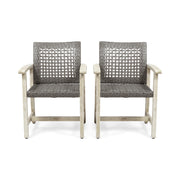 Set of two Noble House outdoor dining chairs with acacia wood frames and slatted seats, ideal for patio or garden seating.
