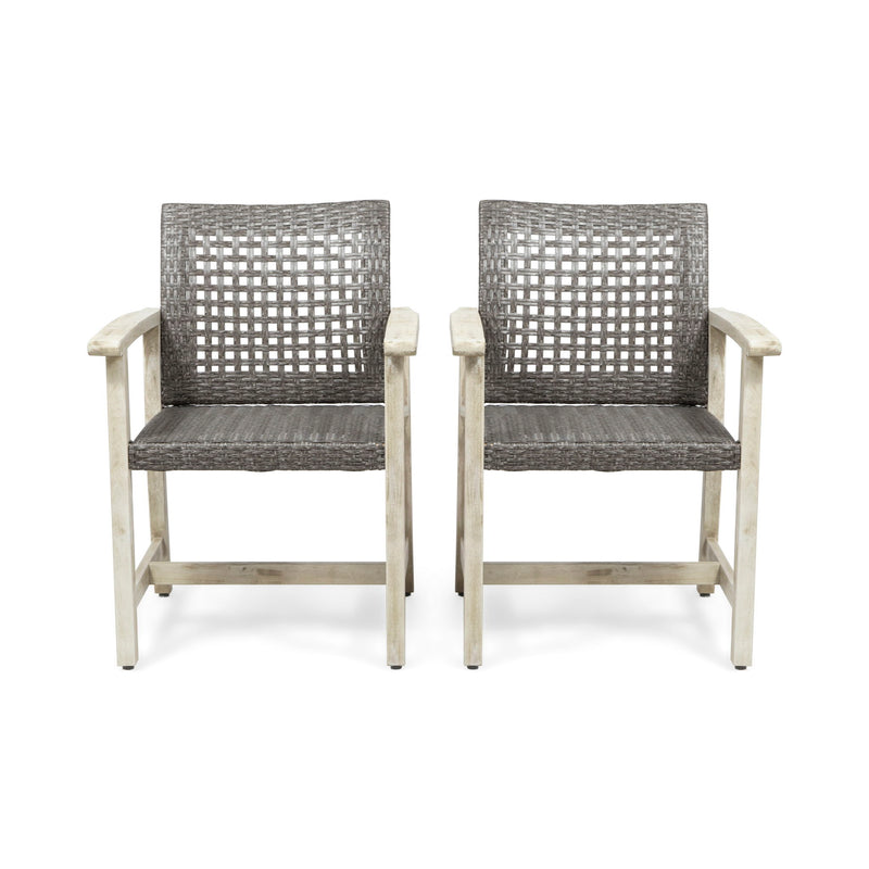 Set of two Noble House outdoor dining chairs with acacia wood frames and slatted seats, ideal for patio or garden seating.