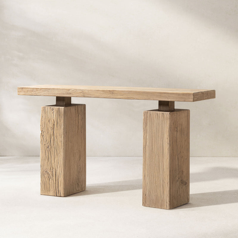 Jennifer Taylor Home Calder console table in natural wood finish, showcasing sleek design and smooth surface.