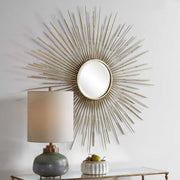 Gold Rays Starburst Mirror by Uttermost, wall mirror with a sunburst design featuring a circular central mirror and radiating gold rays.