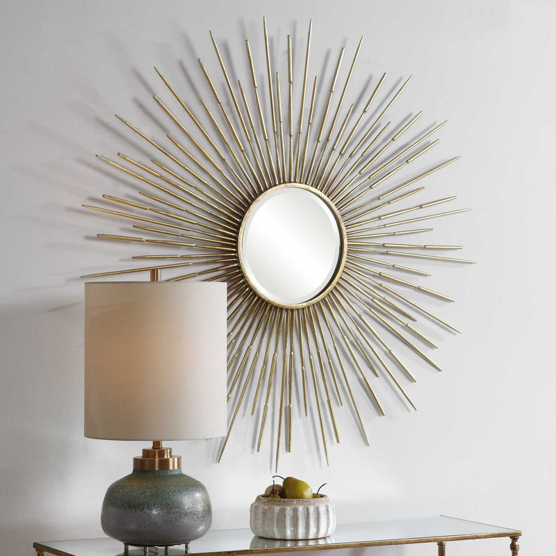 Gold Rays Starburst Mirror by Uttermost, wall mirror with a sunburst design featuring a circular central mirror and radiating gold rays.