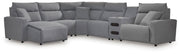 Signature Design by Ashley Modmax II reclining sectional in Salt and Pepper fabric, featuring plush cushions and reclining seats.