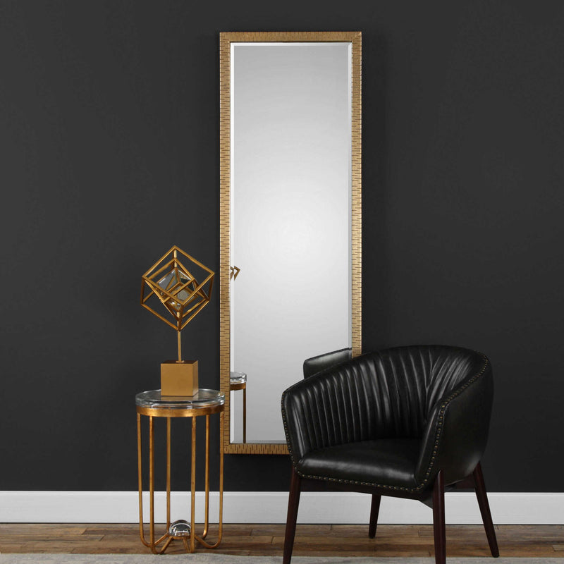 Uttermost Vilmos metallic gold wall mirror with a sleek, modern frame and reflective glass surface.
