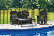 Signature Design by Ashley Hyland Wave 3-piece outdoor set with wicker chairs and glass-top table in a sunny backyard setting.
