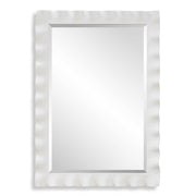 Uttermost Haya scalloped accent mirror with a decorative, wavy frame, perfect for stylish wall decor in living rooms or bedrooms.