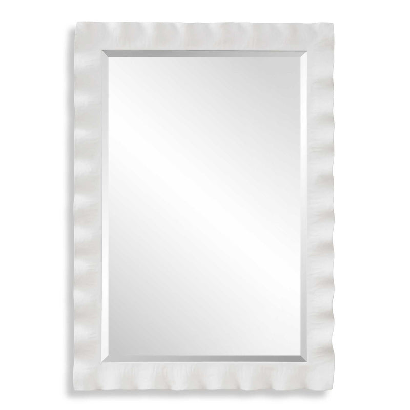 Uttermost Haya scalloped accent mirror with a decorative, wavy frame, perfect for stylish wall decor in living rooms or bedrooms.