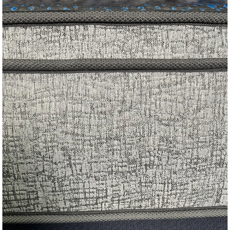 Restonic Comfort Care 13-inch hybrid mattress with firm support, showing plush top and hybrid mattress construction.
