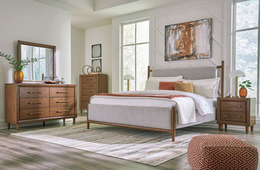 Signature Design by Ashley Lyncott 5-piece upholstered bedroom set with a bed, nightstands, and matching furniture in a cozy bedroom scene.