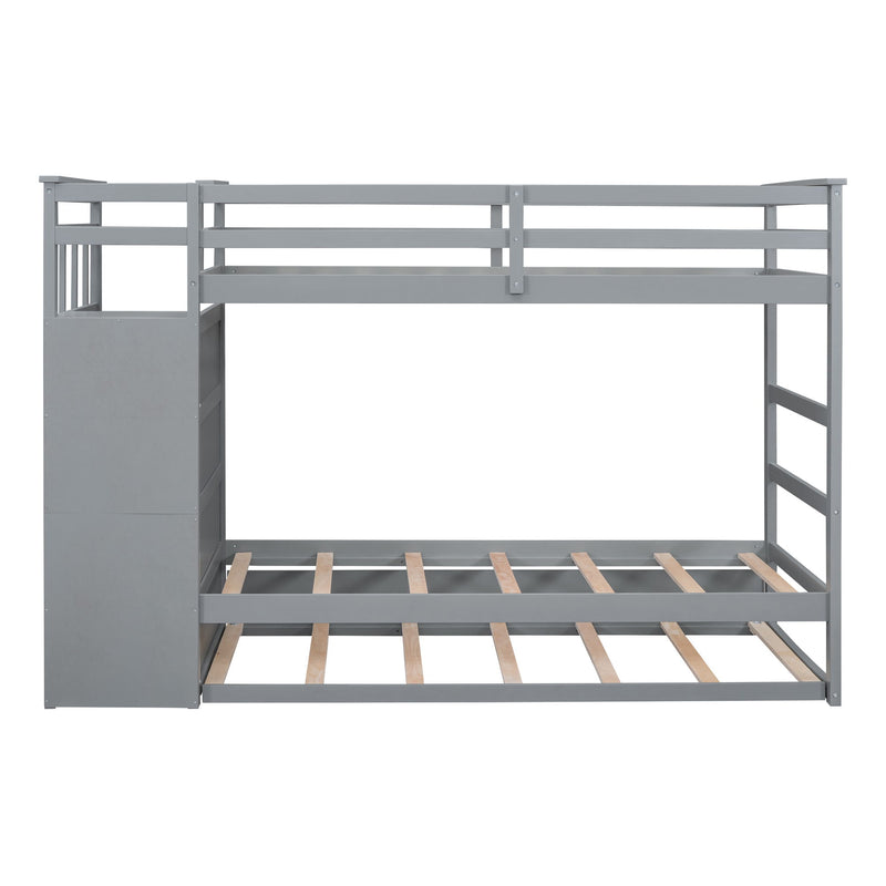 DreamHaus bunk bed with staircase and trundle, featuring sturdy wood construction and space-saving design for children's bedroom.