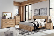 Signature Design by Ashley Hyanna 8-piece storage bedroom set with bed, dresser, and nightstands in a contemporary style.