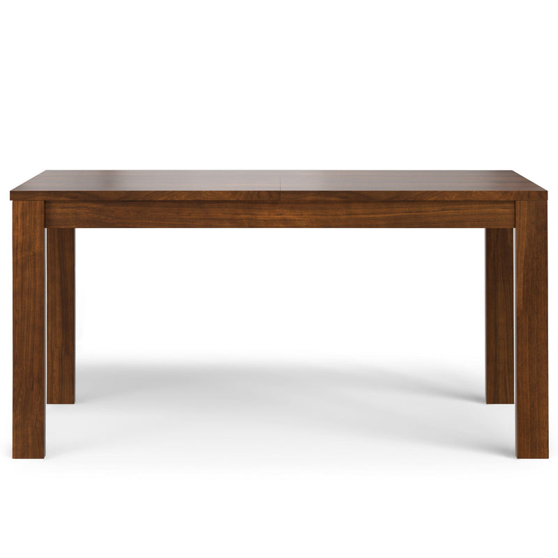 Wilson handcrafted dining table by Simpli-Home, showcasing a spacious wooden surface and sturdy legs in a modern dining setting.