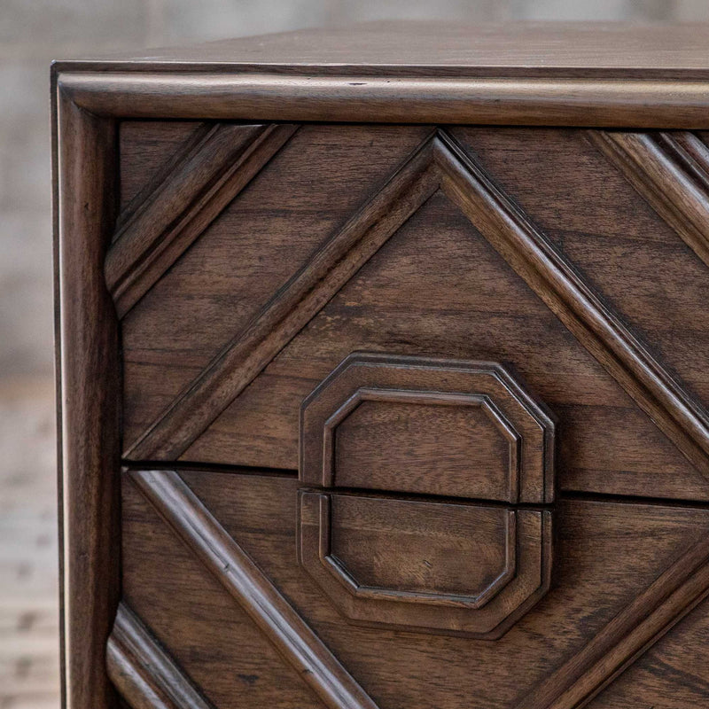 Dark brown Uttermost Mindra Drawer Chest with sleek accent chest design and modern wooden finish, featuring multiple drawers.