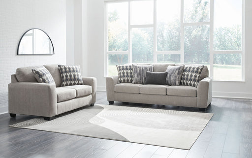 Signature Design by Ashley Avenal Park living room set with stationary chair and ottoman in a stylish fabric, perfect for cozy spaces.