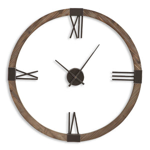 Uttermost Marcelo modern wall clock with light brown wooden frame and minimalist design, hanging on a neutral wall.