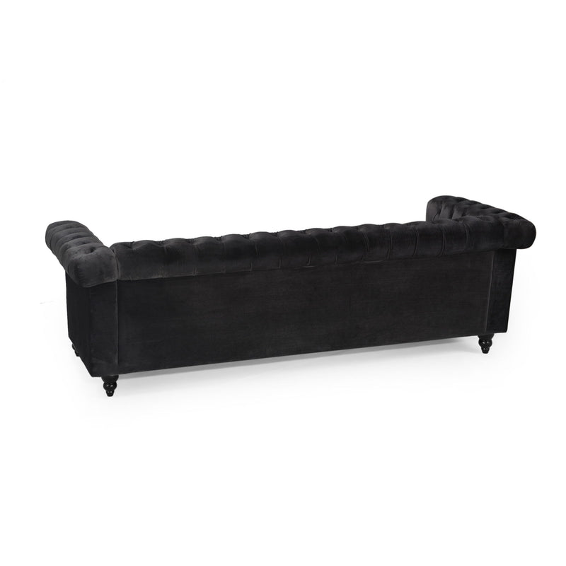 Noble House Chesterfield style 3-seater sofa with deep button tufting and classic stationary design, upholstered in rich fabric.