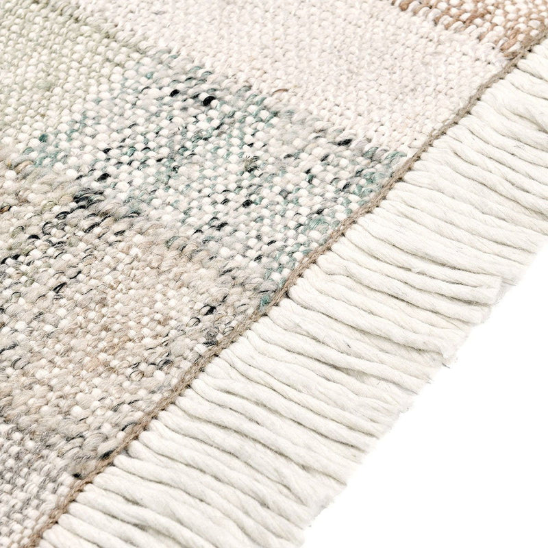 Classic Home Ritsa area rug featuring intricate geometric patterns in neutral tones, perfect for living room or bedroom decor.