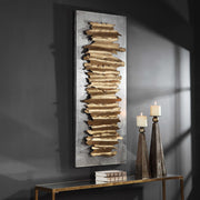 Gold metal wall decor piece by Uttermost featuring an intricate, geometric design for modern wall styling.