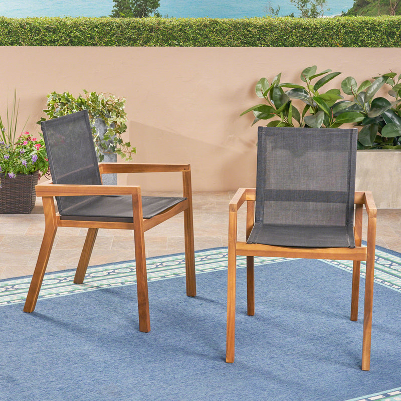 Set of two Noble House Belfast dining chairs with acacia wood frames and cushioned seating, showcasing a modern, stylish design.