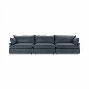 Comfortable beige Caplan modular sectional sofa by Classic Home, showcasing its plush cushions and modern design.