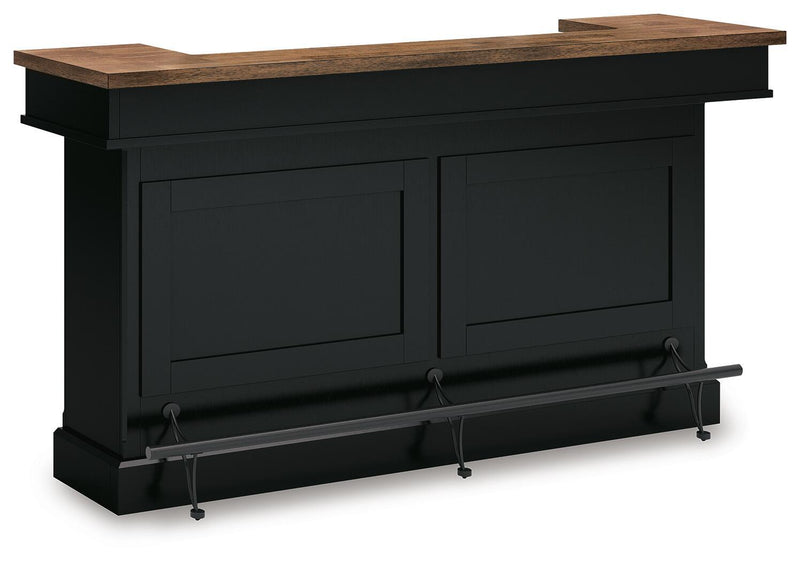 Wildenauer brown and black bar table by Signature Design Ashley, featuring a sleek, modern design with sturdy legs and spacious surface.