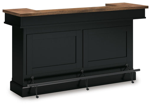 Wildenauer brown and black bar table by Signature Design Ashley, featuring a sleek, modern design with sturdy legs and spacious surface.