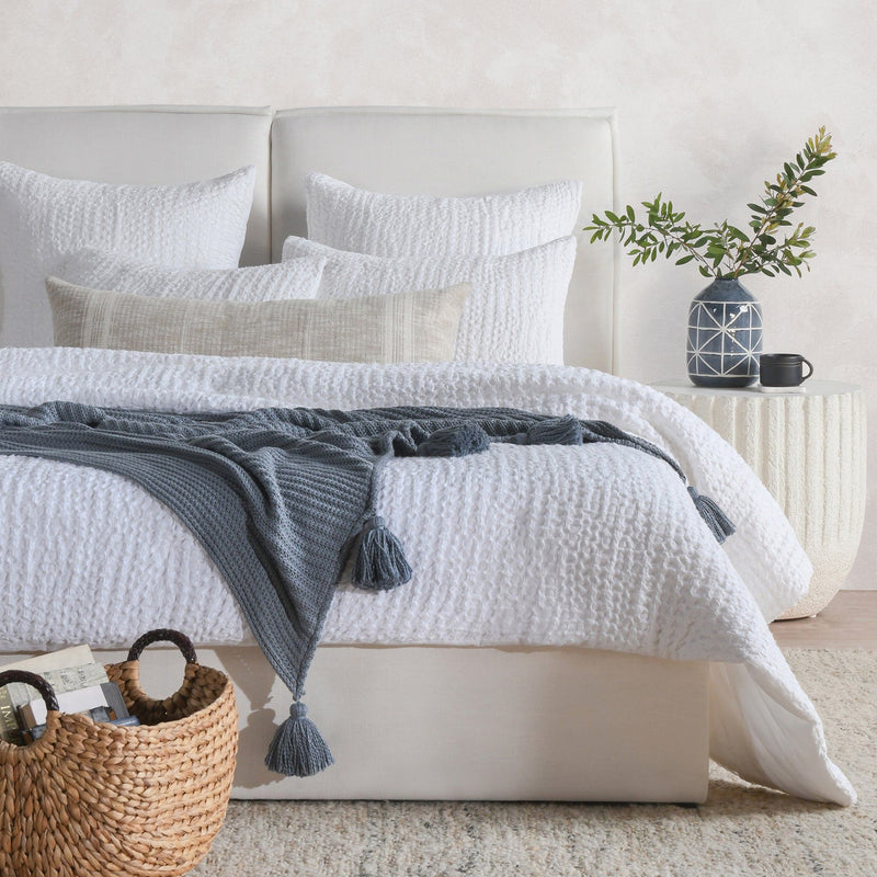 Classic Home Colmar quilt sham with intricate embroidery, featuring soft fabric and decorative stitching for a cozy bedroom look.